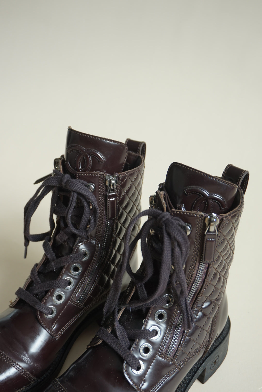 “Chanel” Dark Burgundy Shiny Calfskin Quilted CC Lace Up Combat Boots - Size 36.5