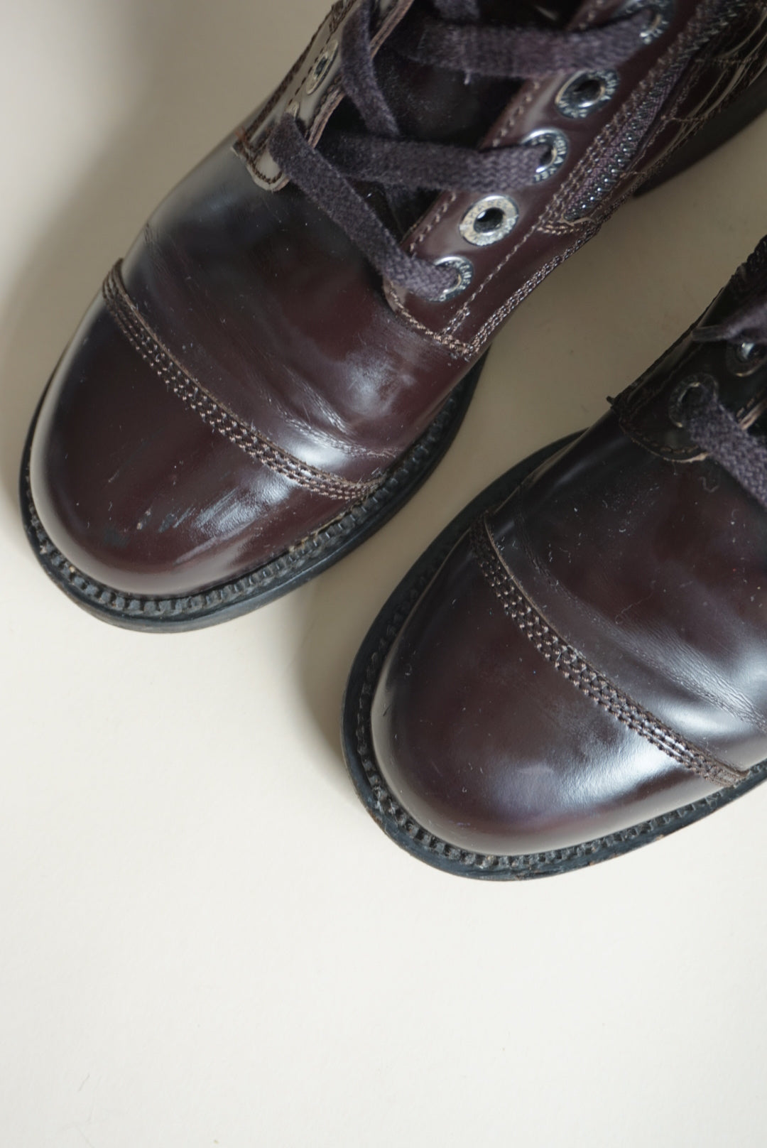 “Chanel” Dark Burgundy Shiny Calfskin Quilted CC Lace Up Combat Boots - Size 36.5
