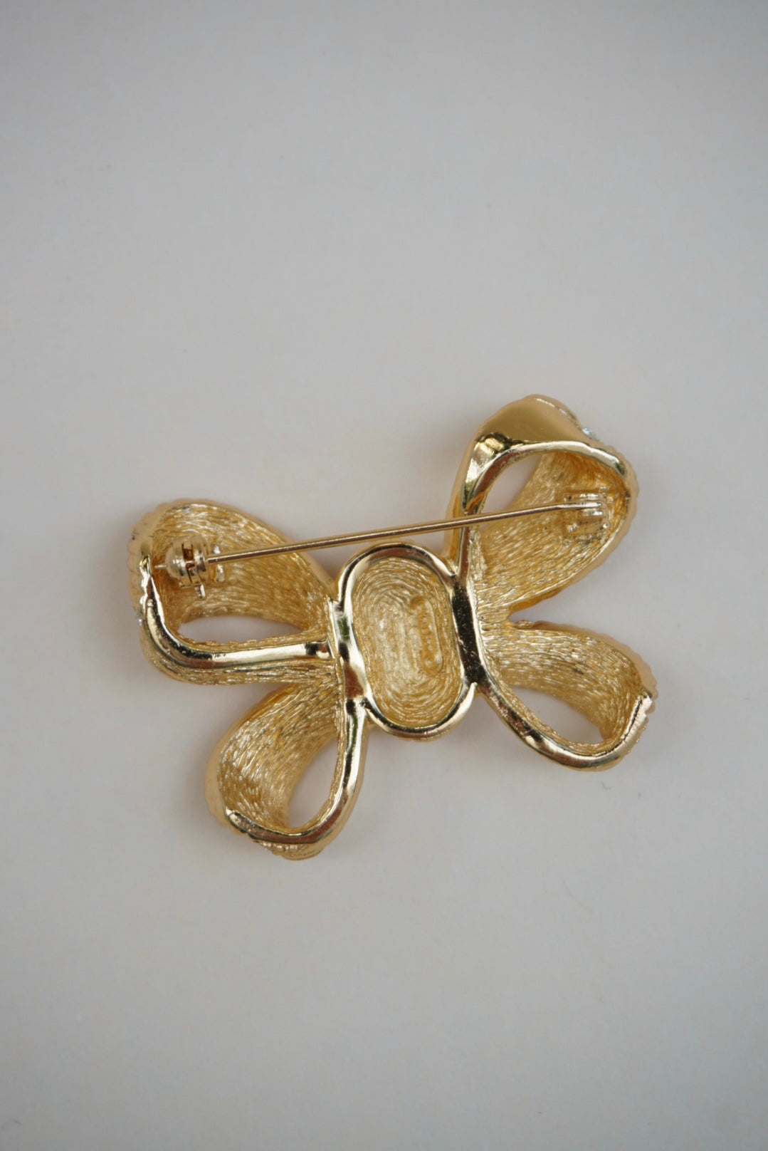 Vintage Unlabeled Faux Rhinestone Bow Brooch