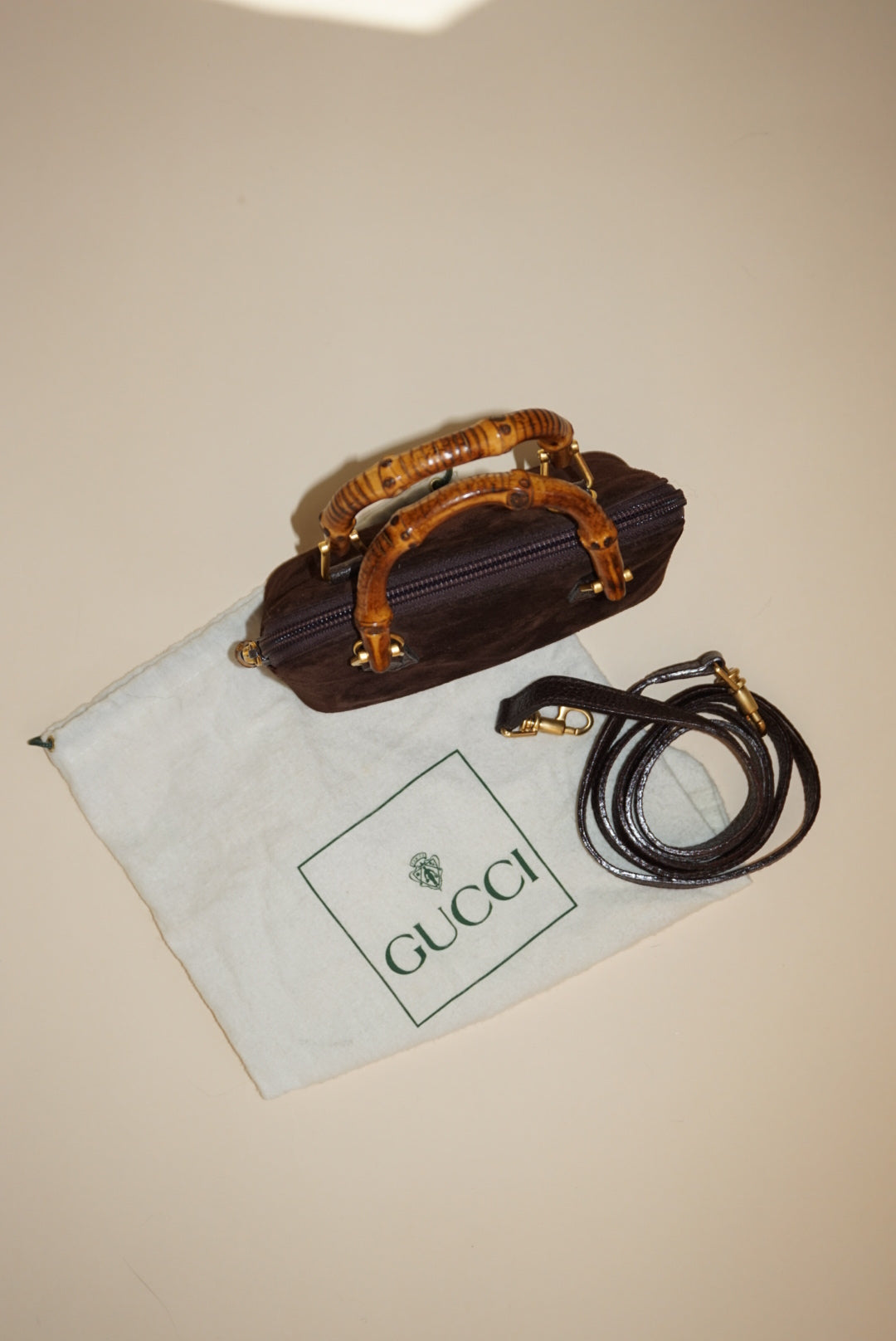 “Gucci” 80’s Brown Suede Mini Vintage Bamboo Handbag