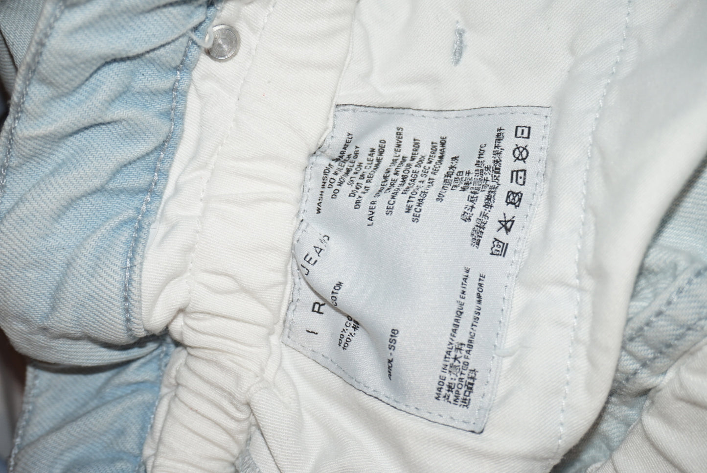 "Iro" Paper bag Light Wash Mini Frayed Hem Skirt - Size 34