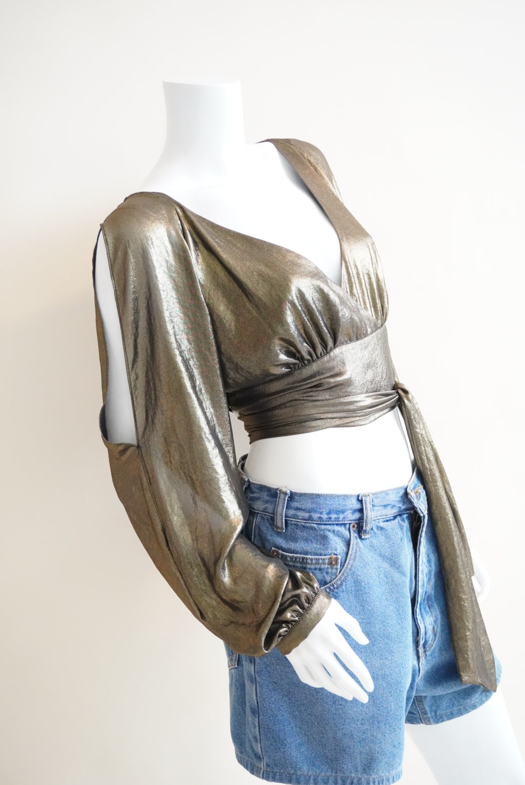 Bebe Genie Gold Metallic Open Back Slit Sleeve Wrap Top NWT - Size L