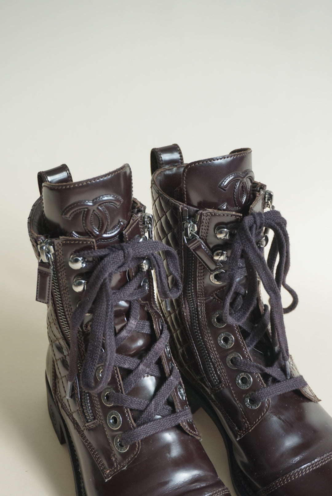 “Chanel” Dark Burgundy Shiny Calfskin Quilted CC Lace Up Combat Boots - Size 36.5